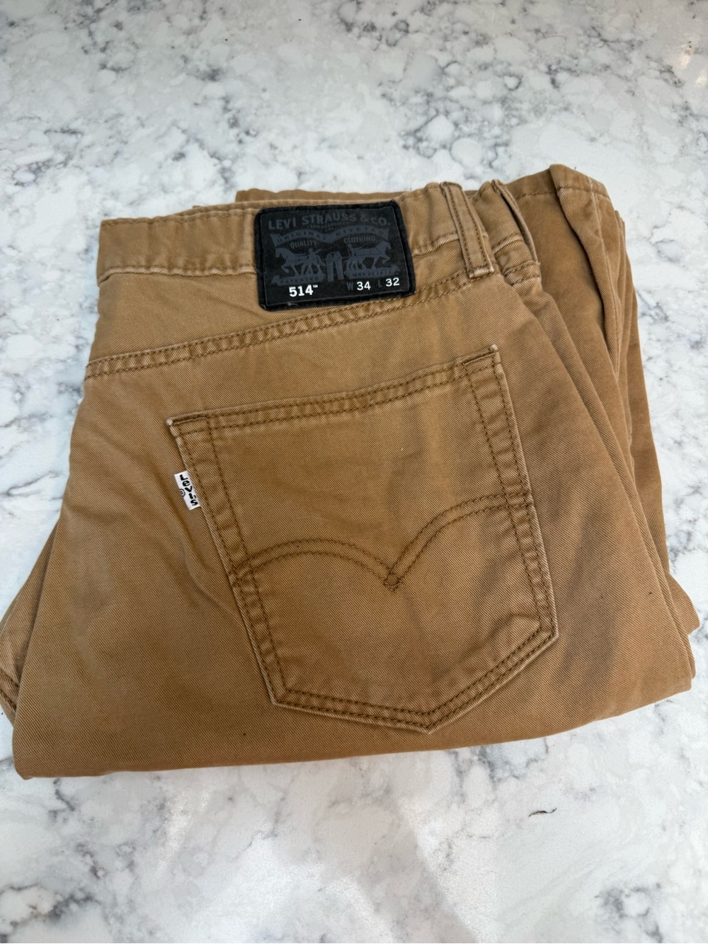 Levi's brown straight-fit jeans with signature back pocket